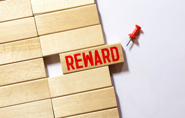 reward word background on wood blocks, concept