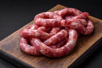 Raw sausages from pork or beef with salt, spices and herbs