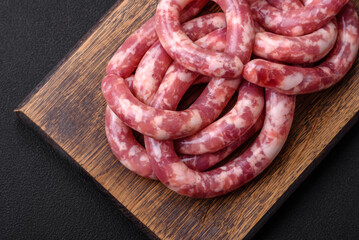 Raw sausages from pork or beef with salt, spices and herbs