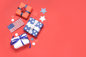 Gift boxes with USA flag and confetti on red background. American Independence Day