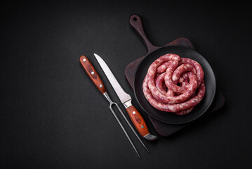 Raw sausages from pork or beef with salt, spices and herbs