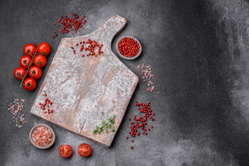 Ingredients for cooking cherry tomatoes, salt, spices and herbs