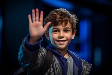 Medium shot portrait photography of a glad kid male waving with the hand against a deep indigo background. With generative AI technology