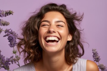 Headshot portrait photography of a grinning girl in her 20s placing the hand over the mouth in a laughter gesture against a soft lavender background. With generative AI technology