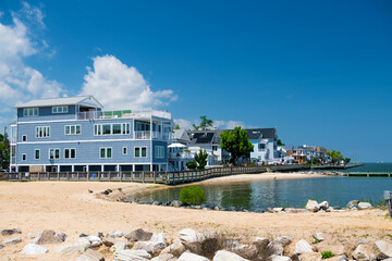 Shoreline along the Chesapeake Bay Homes, in North Beach, Maryland. Sunny day, blue sky.
