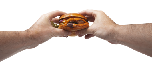deux mains qui tiennent un hamburger sur fond transparent