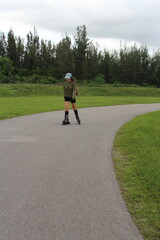 woman rollerblading in the park