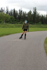woman rollerblading in the park