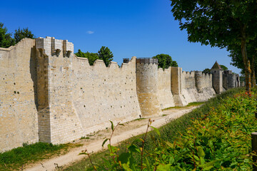 Fototapeta na wymiar Ramparts of Provins, surrounding this World Heritage walled city located in the French department of Seine et Marne in Paris region - The town once hosted one of the largest Champagne fairs