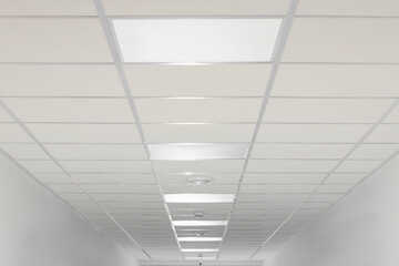 White ceiling with modern lighting in room