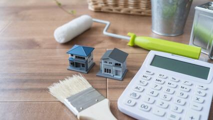 電卓と塗装道具│リフォーム・塗装業者・DIY　見積りイメージ