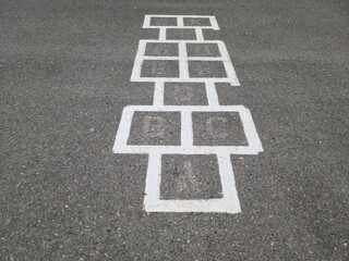 Hop Scotch on the cement road inside school