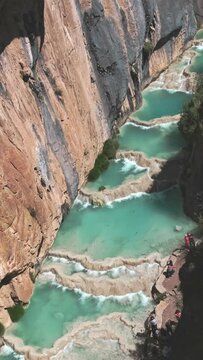 Natural pools of Millpu in Huancaraylla. Turquoise lagoons near Ayacucho, travel destination in Peru