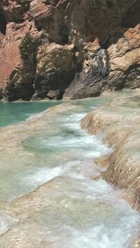 Natural pools of Millpu in Huancaraylla. Turquoise lagoons near Ayacucho, travel destination in Peru