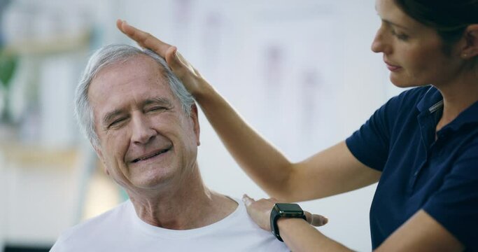 Wellness, physiotherapist and elderly man with neck injury, pain or accident at a physiotherapy consultation. Healthcare, female chiropractor and senior male patient with a sprain muscle at a clinic.