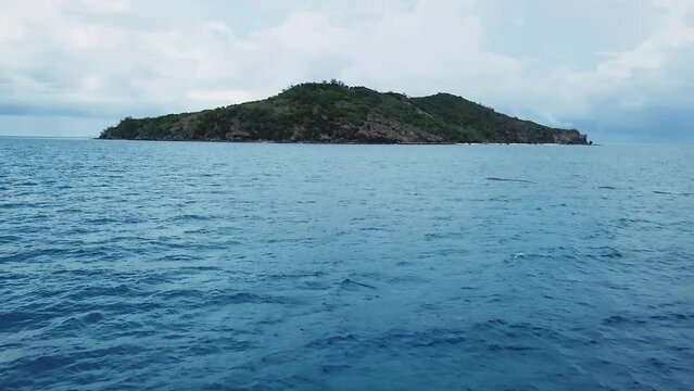 Fiji Drone lost at Castaway Island Wilson on holiday surf paradise Nadi resort dry season Coral reef aqua deep blue scenic sunny beautiful relaxing aerial cinematic forward pan up movement