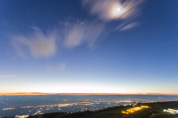 High mountain peak in the early morning with the strong light of the beautiful sun