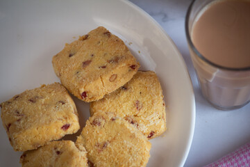 Refreshment time with cookies and a glass of tea. Tea time with snacks.