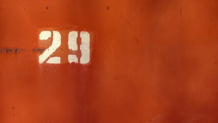 number on a red wall