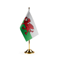 Small national flag of the Wales on a white background