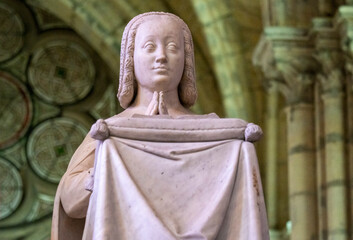 Close up of marble statue of Anne of Bretagne, early queen of France in an attitude of prayer in...