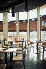 Empty restaurant cafe, diner or coffee shop for retail services, hospitality industry or sales service. Interior design decor, bistro store and trendy small business with furniture, chair and table