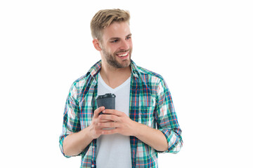 cheerful man with morning coffee on background. man with morning coffee in studio.