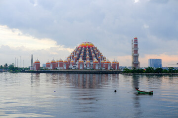 Naklejka premium The 99 Dome Mosque in Makassar, South Sulawesi. Unique mosque with 99 domes. The mosque was built on the reclamation land of Losari Beach, Makassar.