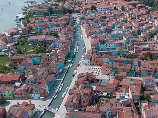 Fototapeta premium Burano colored houses island. Rainbow city. Positive drone view. 