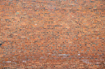 Large red brick wall full frame