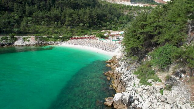 Rotating Aerial View Revealing A White Beach With Turquoise Water And Lush Green Vegetation, Marble Beach, Thassos Island, Greece