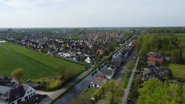 Aerial push in view of a residential area in Limmen and s-Graveland drone, Netherlands