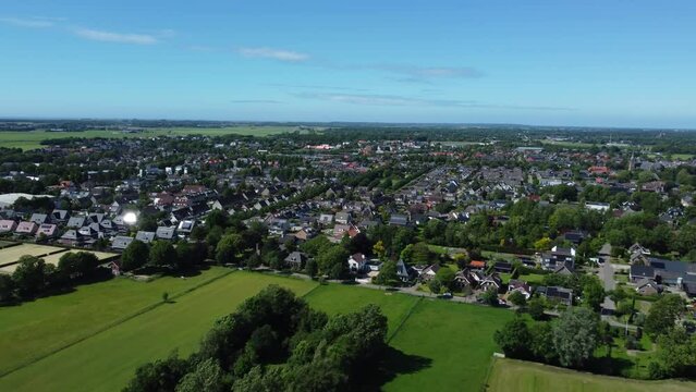 Aerial push in view of a residential view of Limmen and s-Graveland, Netherlands