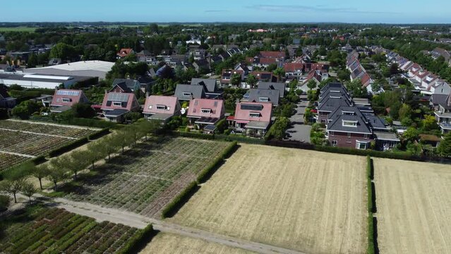Aerial tilt-down view of open fields in Limmen and s-Gravelan, The Netherlands