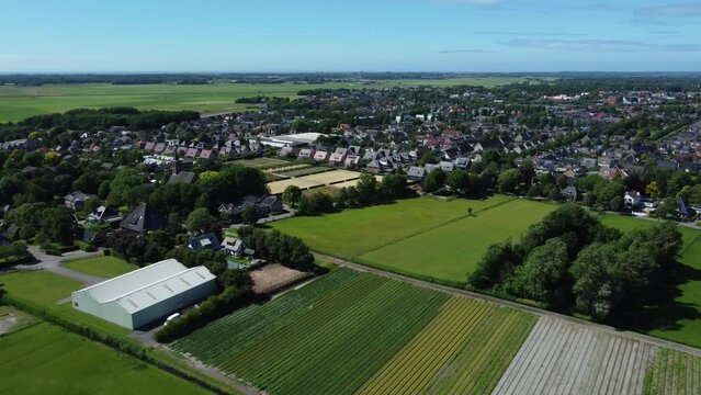 Aerial Pull away view of a residential area full of trees