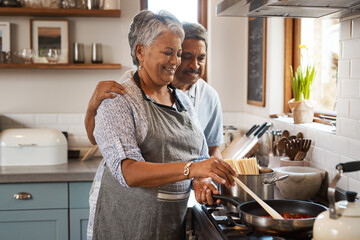 Love, cooking and old man with happy woman at stove in kitchen, embrace and healthy marriage...