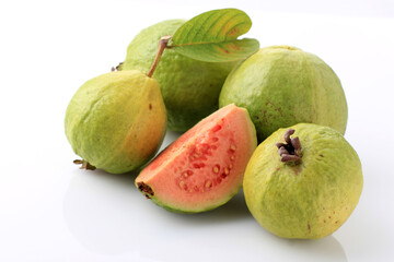 Guava Fruit, Pink, Fresh, Organic, with Leaves, Whole and Sliced, Isolated on White Background.