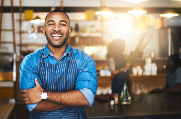 Coffee shop, happy barista and portrait of black man in cafe for service, working and crossed arms....