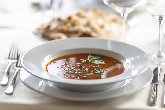 Plate Of Italian Minestrone Soup With A Fancy Serving In A Restaurant