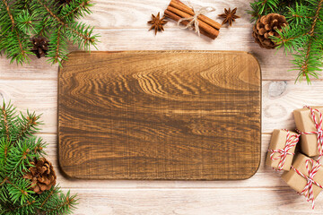 wood cutting board at table background with christmas decoration, Round board. New Year concept - Powered by Adobe