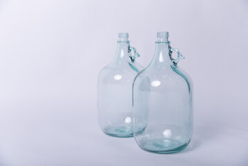 empty glass bottle on white