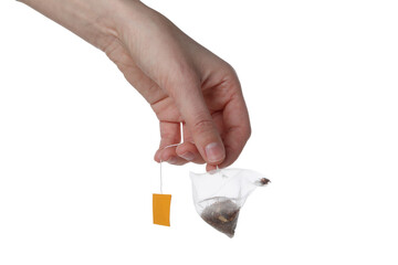 PNG, Female hand holds tea bag, isolated on white background