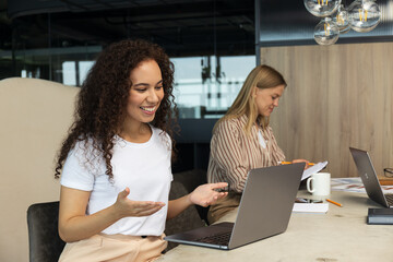 Young people working in office, coworking and office concept