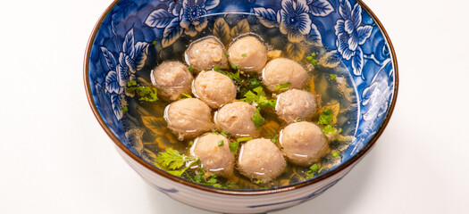 
Bakso Meatballs with Soup Served Chili Sauce Indonesia Food Style Popular Street Food Goodtasty decorate with carved Leek and Spring Onions topview