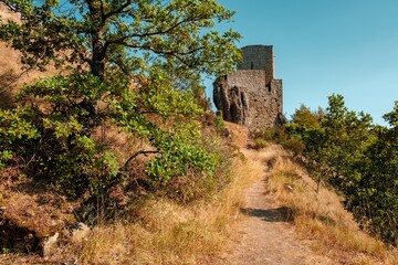 Fototapeta na wymiar The old medioeval castle of Pietrarubbia's village in the region of Marche in central Italy