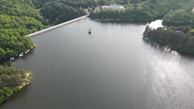 Aerial Spring view of Dushantsi Reservoir, Sredna Gora Mountain, Sofia Region, Bulgaria