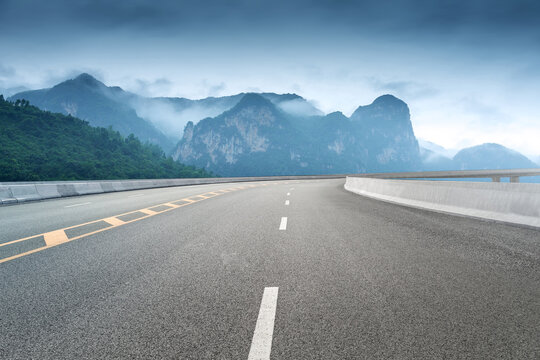 Empty highways and distant mountains