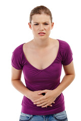 Stomach ache, pain and woman with health problem isolated on transparent, png background. Portrait of frustrated person with constipation, digestion or colon cancer risk and hands on abdomen for gut