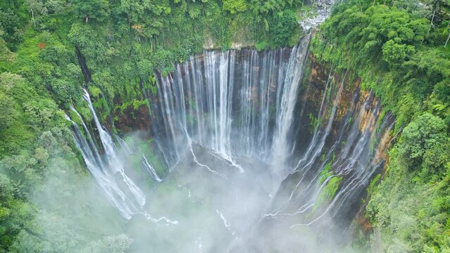 Aerial view of Tumpak Sewu waterfall. Java Island, Indonesia