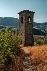 The old medioeval tower of Pietrarubbia's village in the region of Marche in central Italy